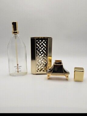 GUERLAIN Mitsouko Bottle With Reliable 1982 Golden Holder